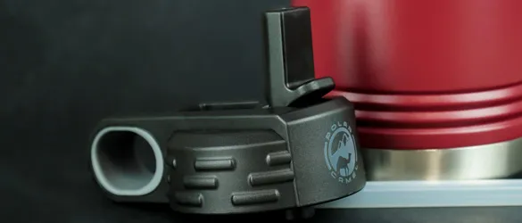 close up of ice in metal tumbler 