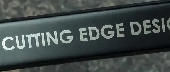 close up of etching on black metal