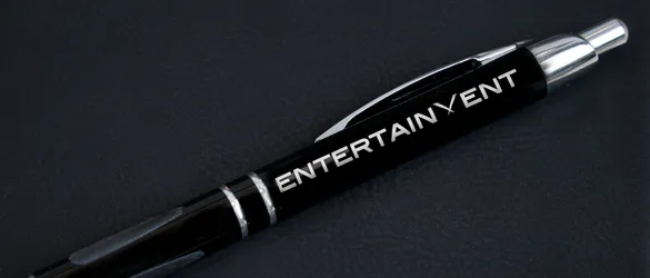 sleek black metal pen aon black background