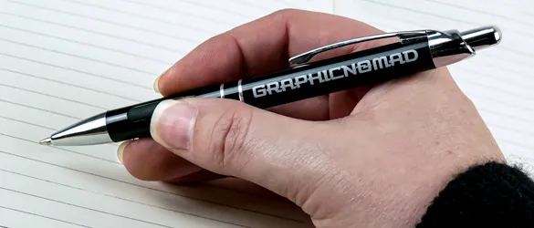 metal pen in hand