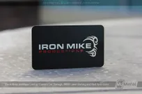 Black-Metal-Business-Card-With-Cutout-Logo-And-Red-Spot-Color