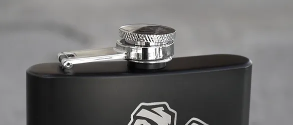 top of black metal flask