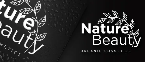 Logo design next to a metal card with the same logo