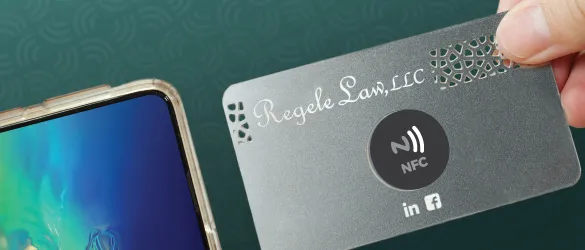Metal NFC Card and phone ready to tap to transfer information
