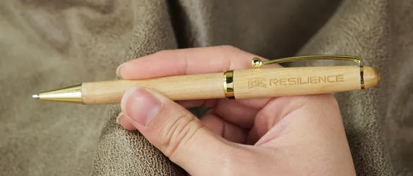 metal pen in hand