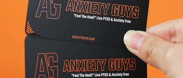 Paper Business Card compared to Metal Business Card in hand
