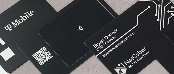 quick metal business cards chemically etched showing varying examples of cut out areas