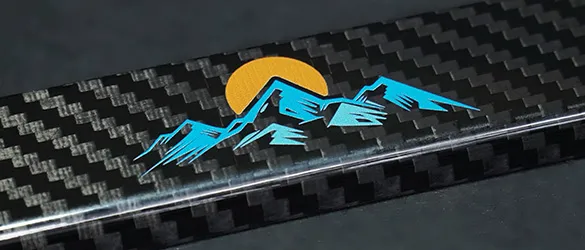 close up of printing on carbon fiber license plate frame