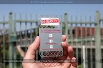 Stainless steel meatl business card featuring chain link fence etched area