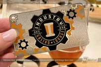 VIP lounge metal business card being held in hand