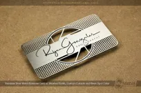 Innovative photographer business card with stainless steel metal finish and camera shutter cutout design
