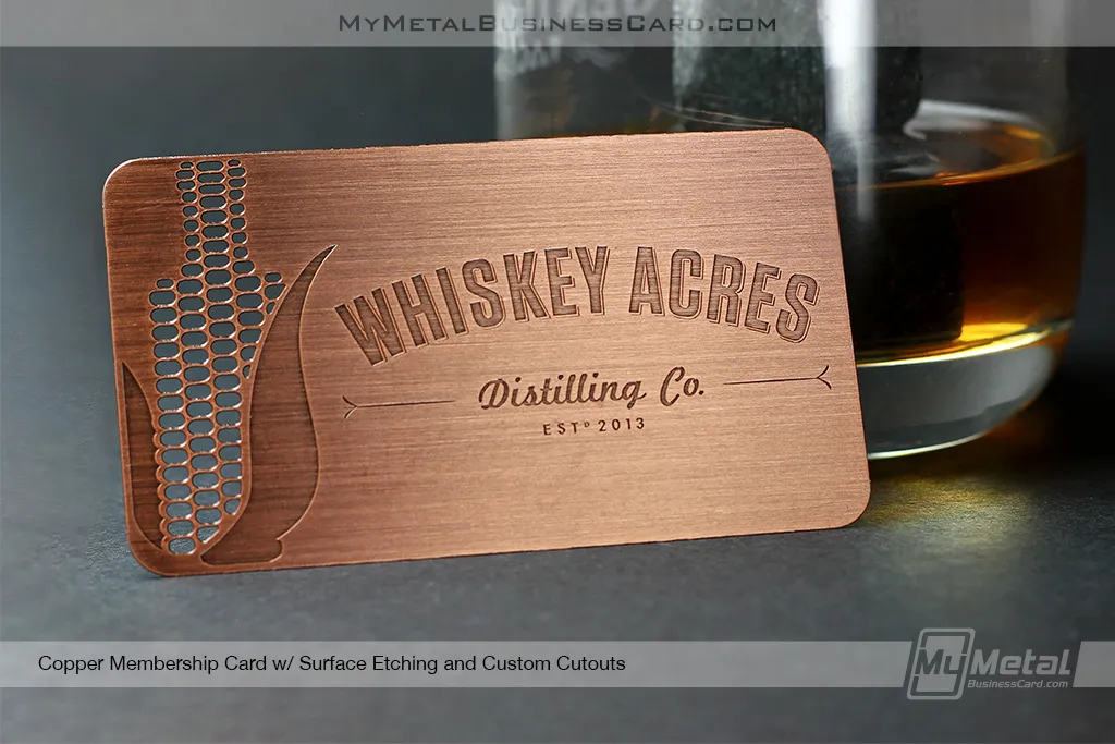 copper finish metal business card for a whikey distilery with cut-out corn see-through unique shape 