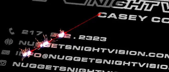 silver laser etching on black quick metal business card