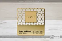 Square Brass Finish Metal Business Card in square shape with unique lettering and hole pattern
