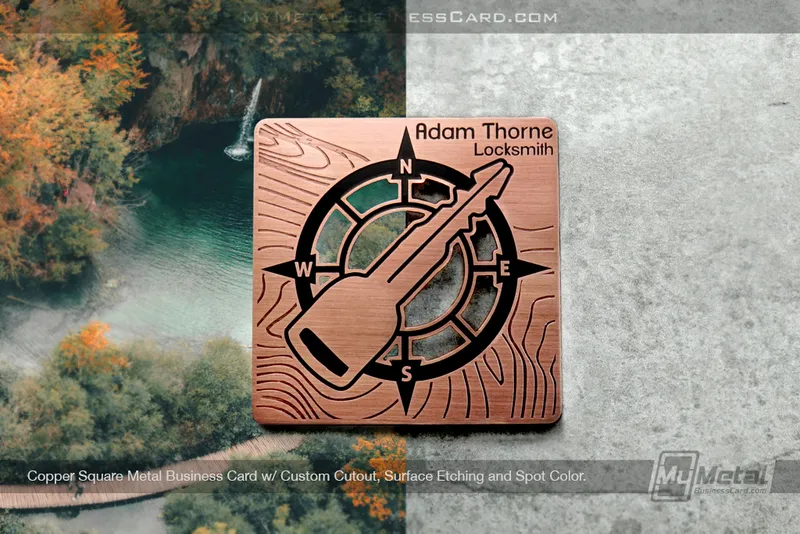 Copper finish square metal business card for locksmith business that's unique with key on front