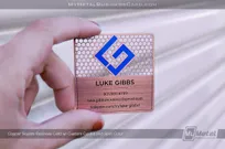 Copper finish square metal business card with blue screen printed color on surface