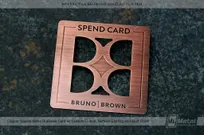 Square metal business card with copper finish and unique cut-through mirrored box pattern