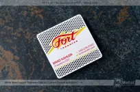 White metal square business card featuring yellow and red screen printed color and hole pattern