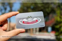 Metal-Business-Card-With-Cutout-Logo-And-Red-Spot-Color