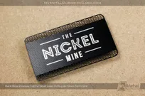 Black-Metal-Business-Card-With-Silver-Laser-Etching-And-Black-Spot-Color