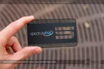 Black-Metal-Business-Card-With-Cutout-Logo-And-Blue-Spot-Color-453121