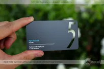 5-Gum-Black-Metal-Business-Card-With-Cutout-Logo-And-Blue-Spot-Color