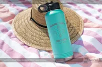Teal-Metal-Water-Bottle-with-Custom-Family-Beer-Inspired-Logo-Etching