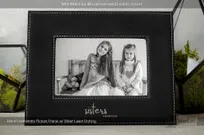 Black-Leatherette-Picture-Frame-With-Custom-Silver-Laser-Sisters-Logo